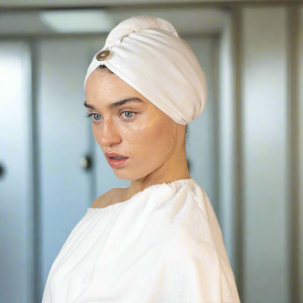 Dry Dolly quick-dry head towel – lightweight, ultra-absorbent & smooth inner layer for anti-frizz hair protection.